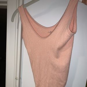 NEVER WORN cute peach urban bodysuit